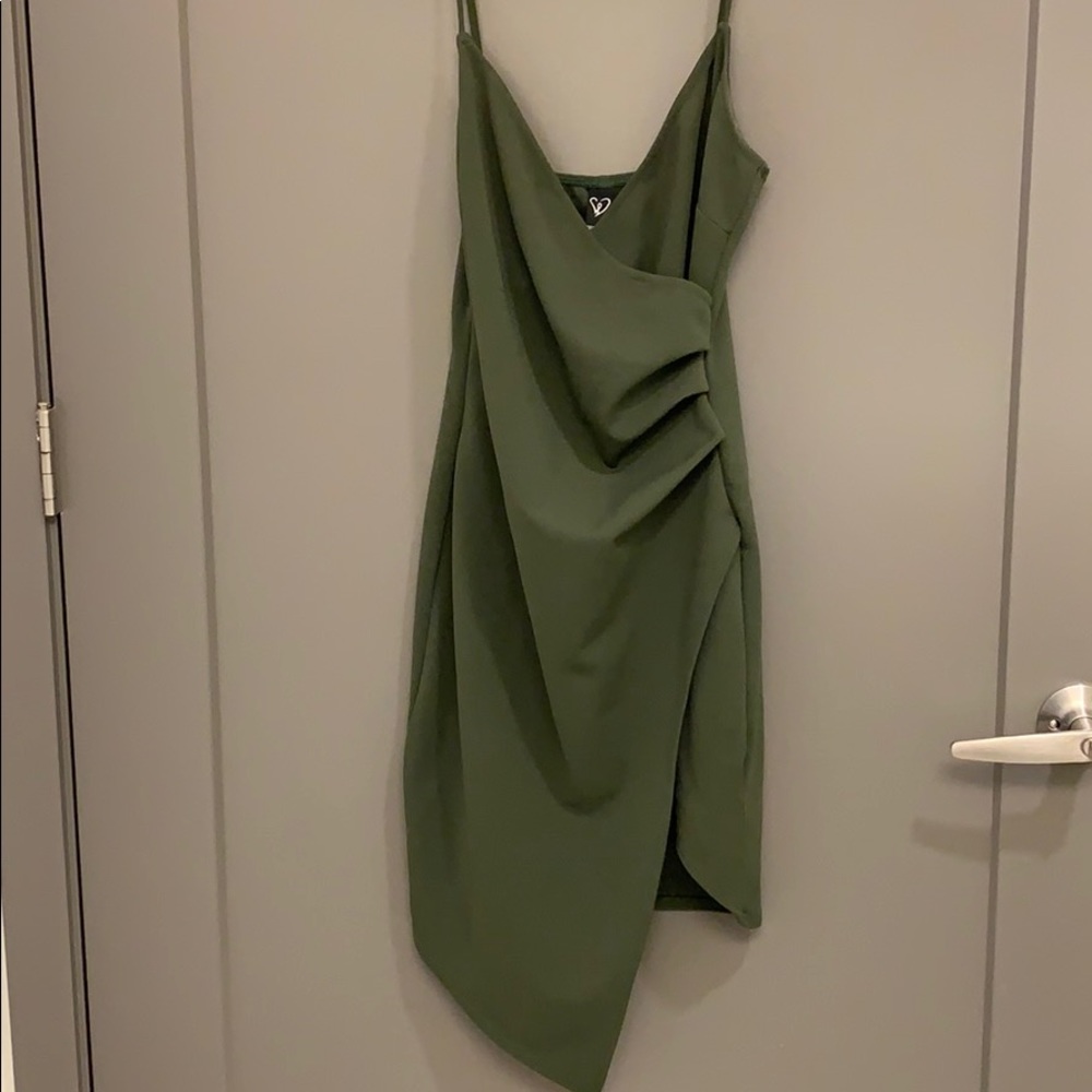 Olive Green fitted dress with a front high low